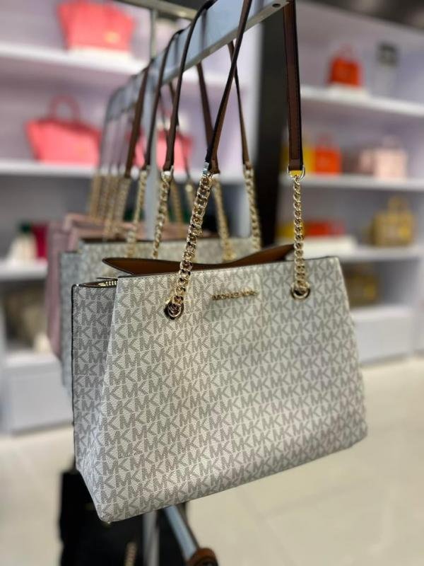 68640cd5f40ad1.jpg Michael Kors teagen sling bag with dust cover - Image 1