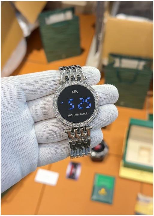 68a56c5dc2cca0.jpg Michael_Kors Touch Fly Silver - Image 1